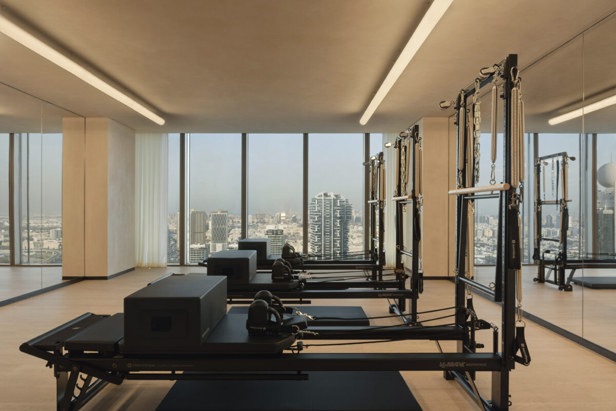 An ultra-modern luxury hotel suite at the Siro Hotel with high-tech wellness amenities.
