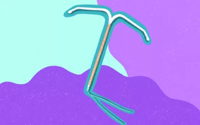 A stylized medical illustration of a T-shaped intrauterine device (IUD) against a purple and teal background.