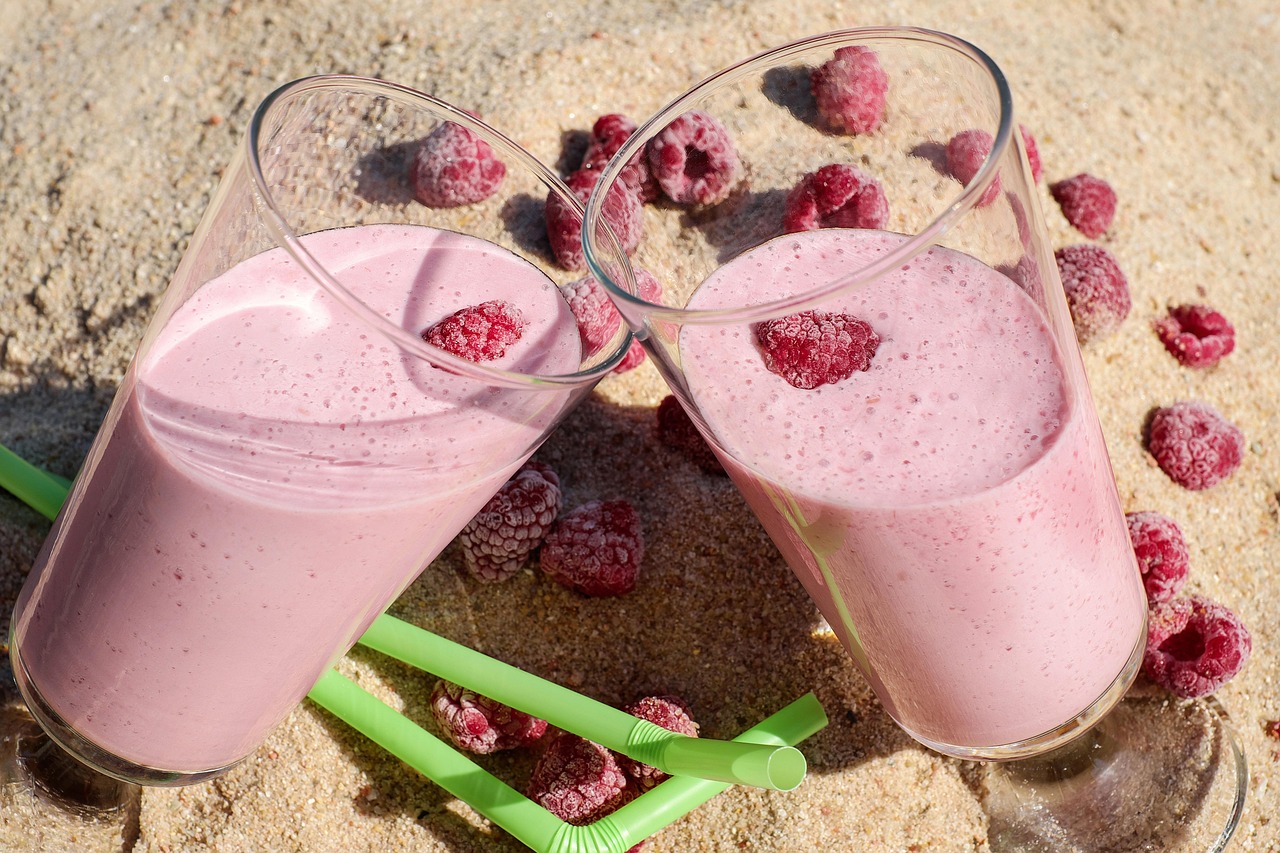 A smooth chocolate protein shake in a glass bottle illustrating perfect mixability.