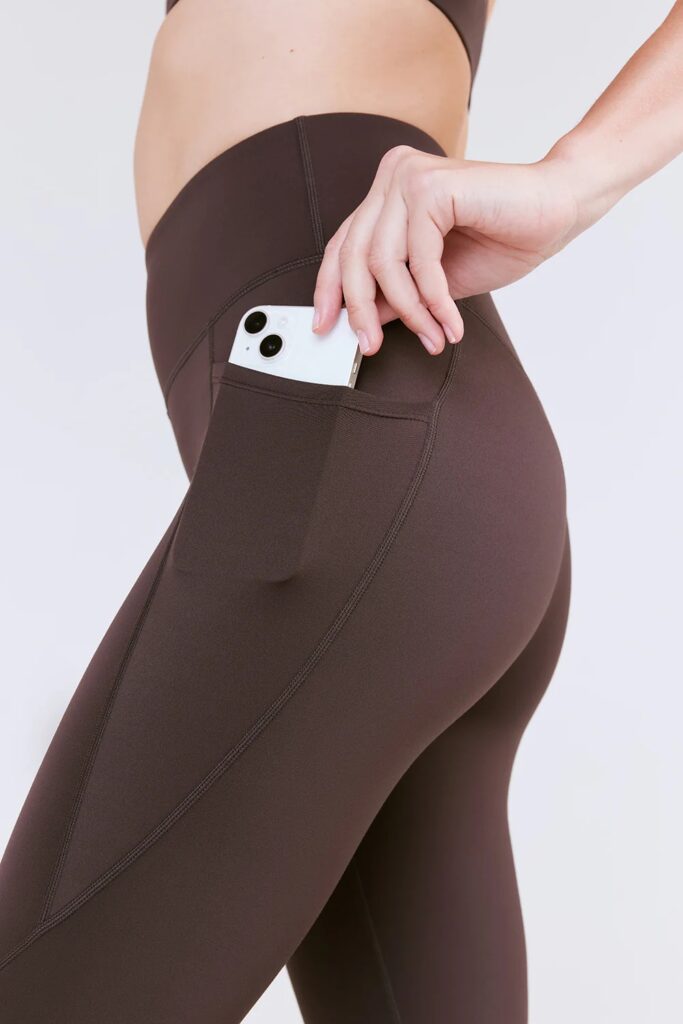 Tala brand pocket leggings being worn during a trail run.