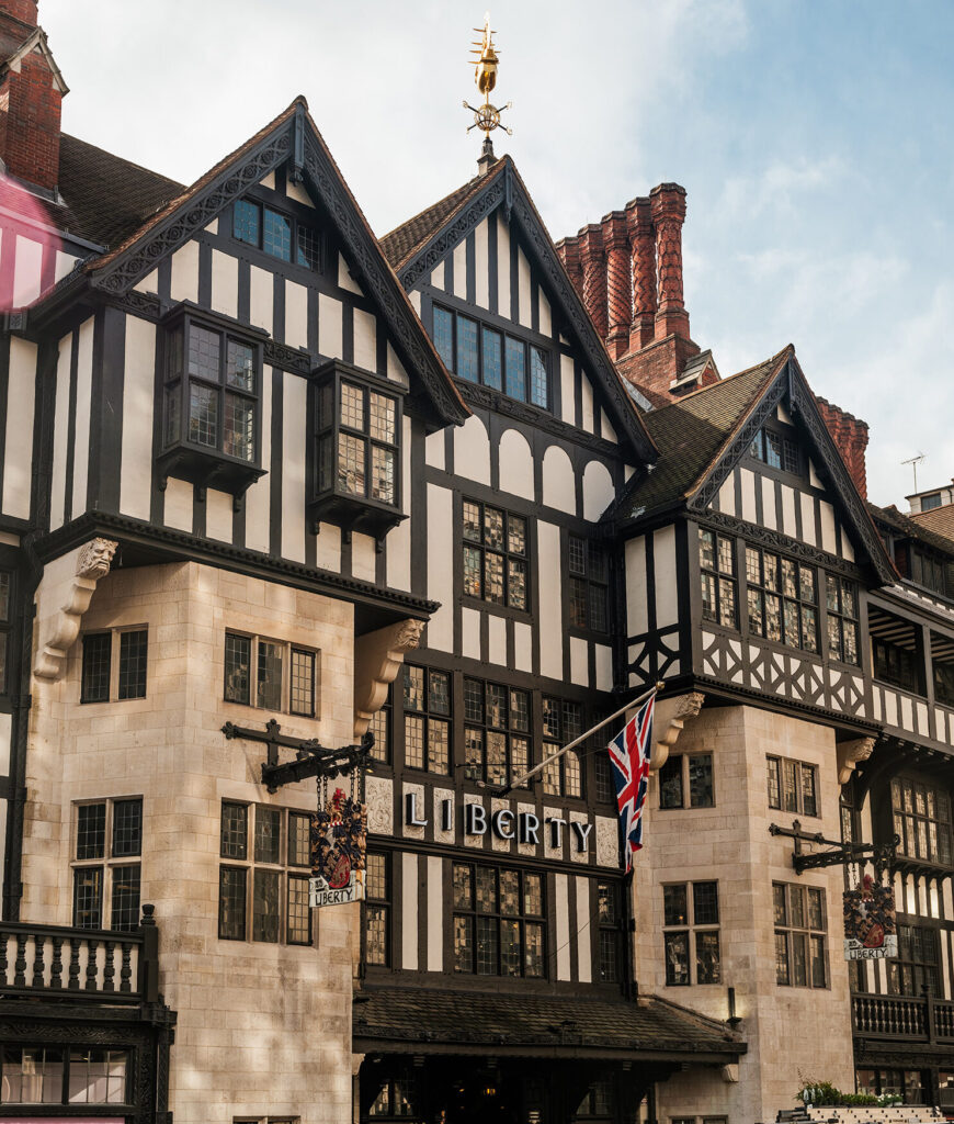 Close-up of a smart wearable device on a woman's wrist showing health metrics.