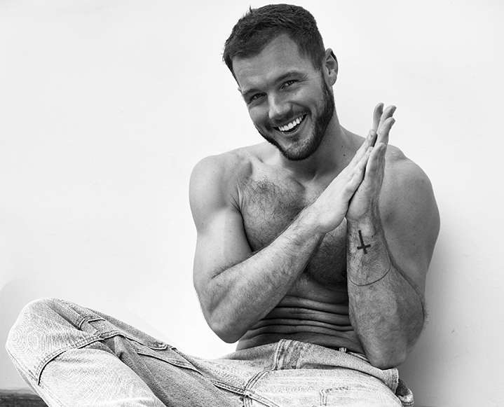 Colton Underwood smiling, representing his role as an LGBTQ+ advocate and new parent.