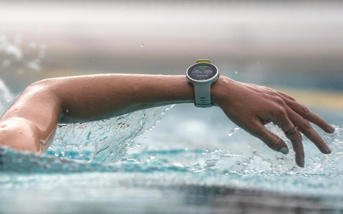 A person wearing a minimalist smart ring designed for biohacking and sleep tracking.
