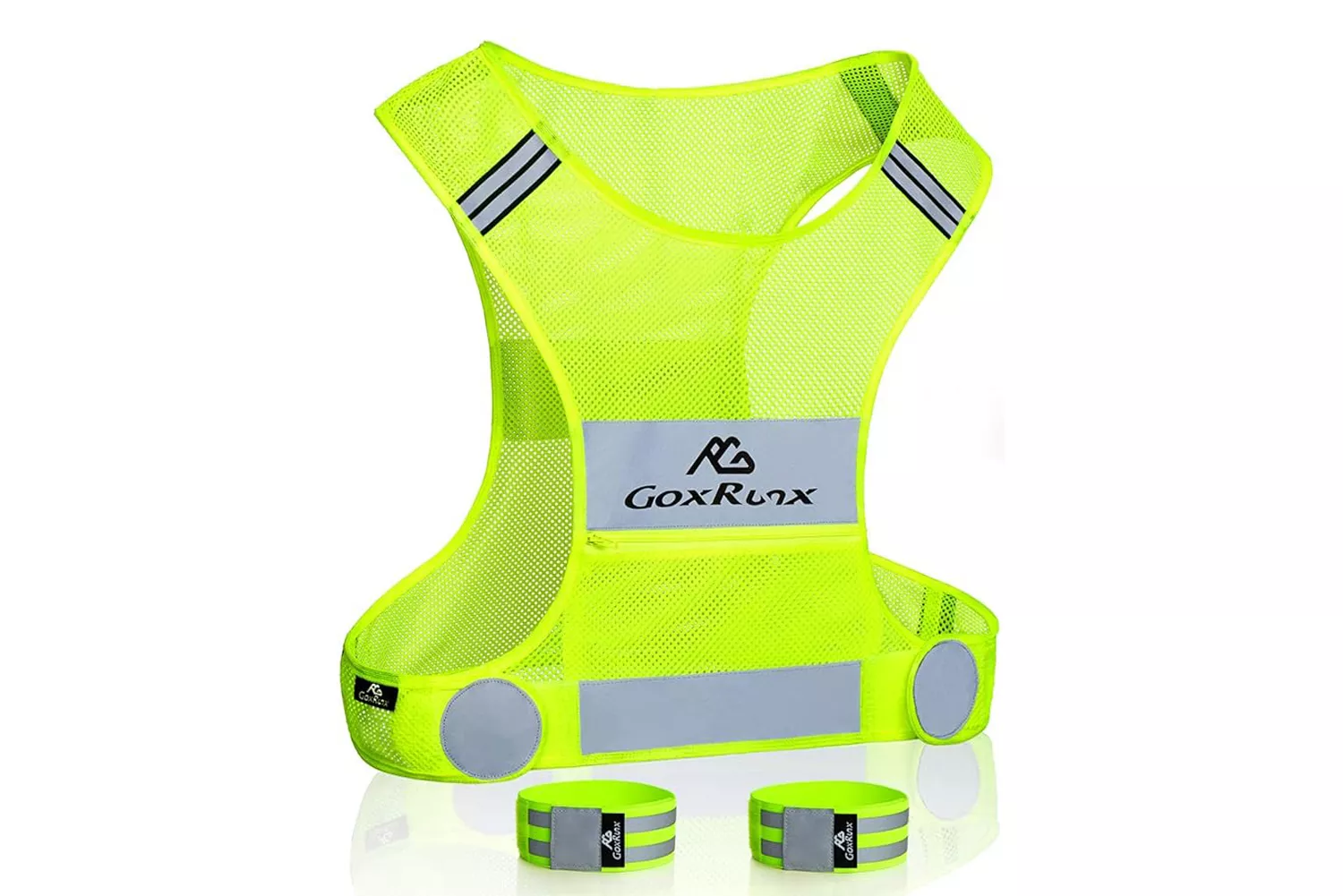 Neon yellow reflective running vest and wristbands laid flat.